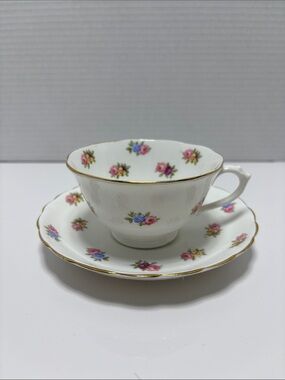 White Floral Bone China Teacup and Saucer with Gold Trim